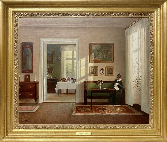 Hans Hilsøe - An interior with a woman sitting on a sofa | MasterArt